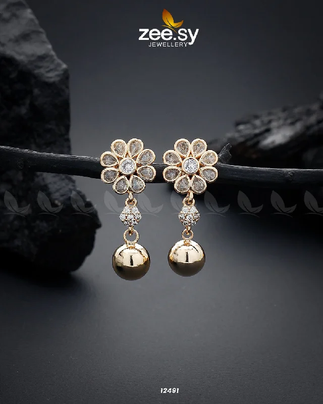 Limited Stock On Premium Jewelry At Low Prices GLOSSY FLOWER EARRING